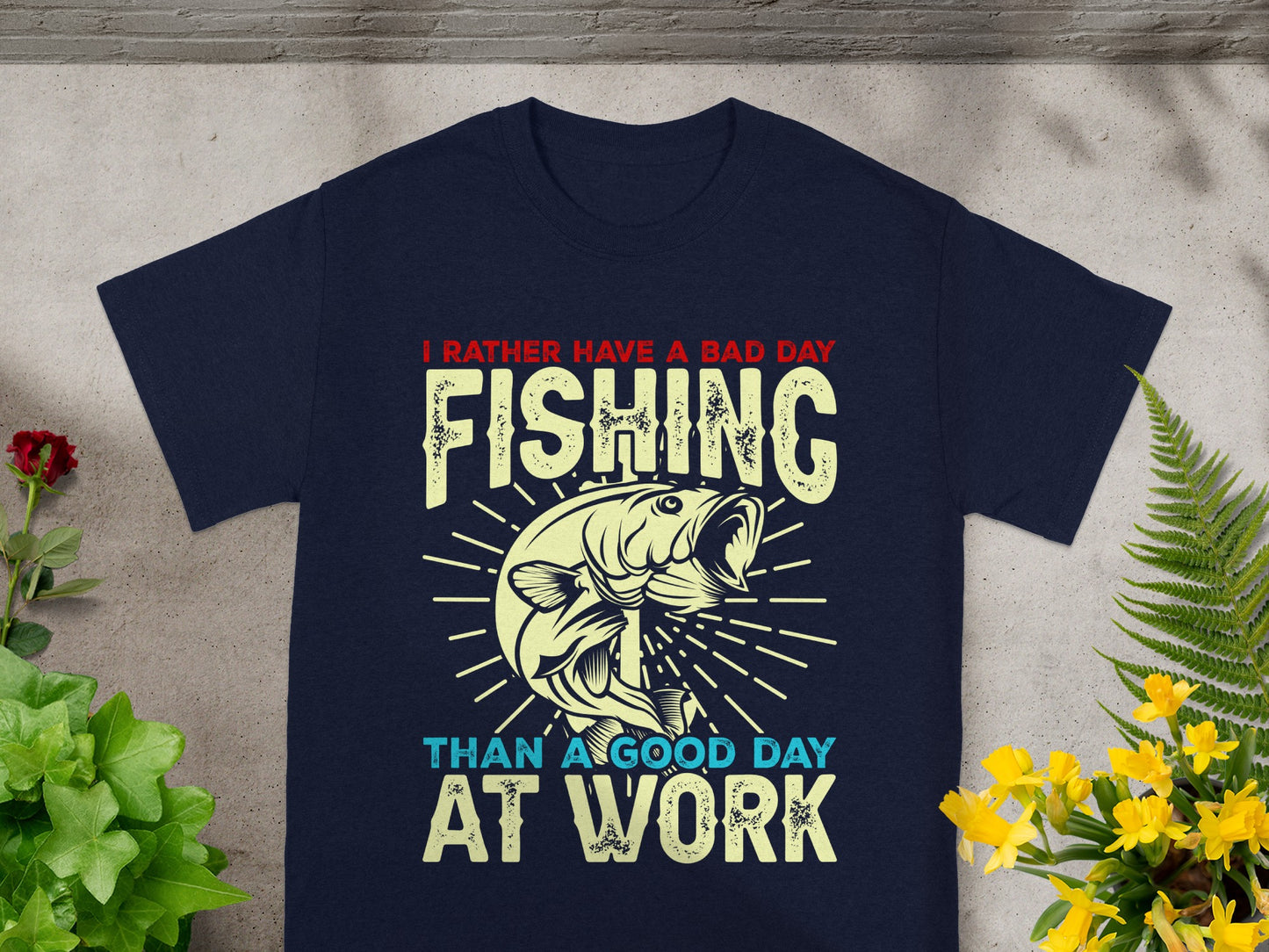 Navy t-shirt with "I rather have a bad day fishing than a good day at work" text.