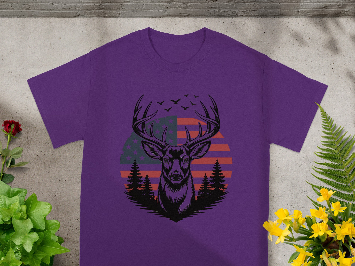 Deer head with antlers and American flag behind, surrounded by pine trees.