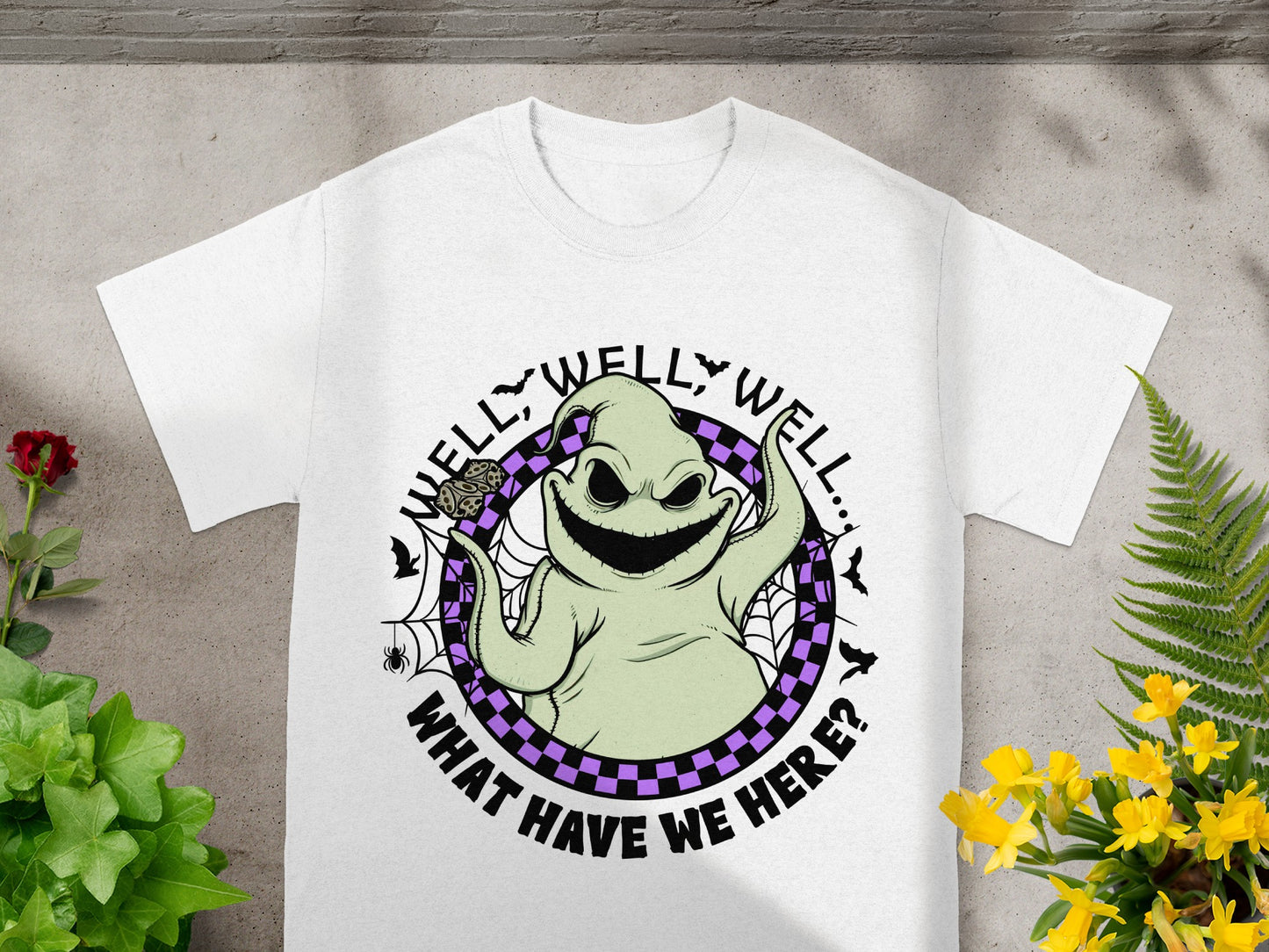 Oogie Boogie character with text "Well, Well, Well... What Have We Here?" on a white t-shirt.