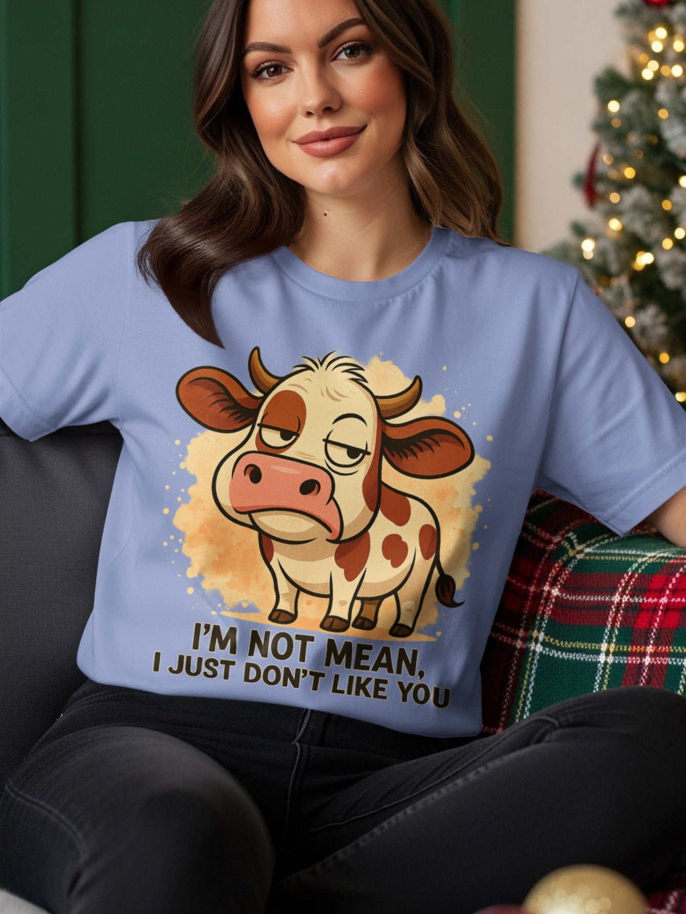 Light blue t-shirt with a cartoon cow and text "I'M NOT MEAN, I JUST DON'T LIKE YOU".