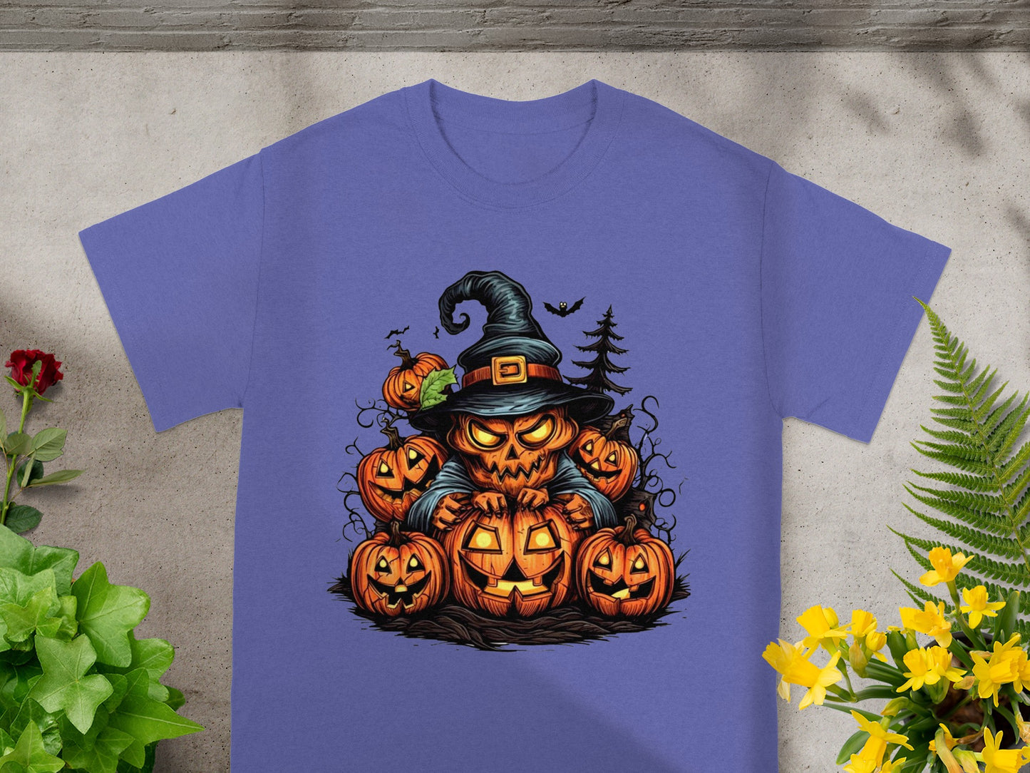 Halloween graphic with a jack-o'-lantern character wearing a witch hat surrounded by pumpkins.
