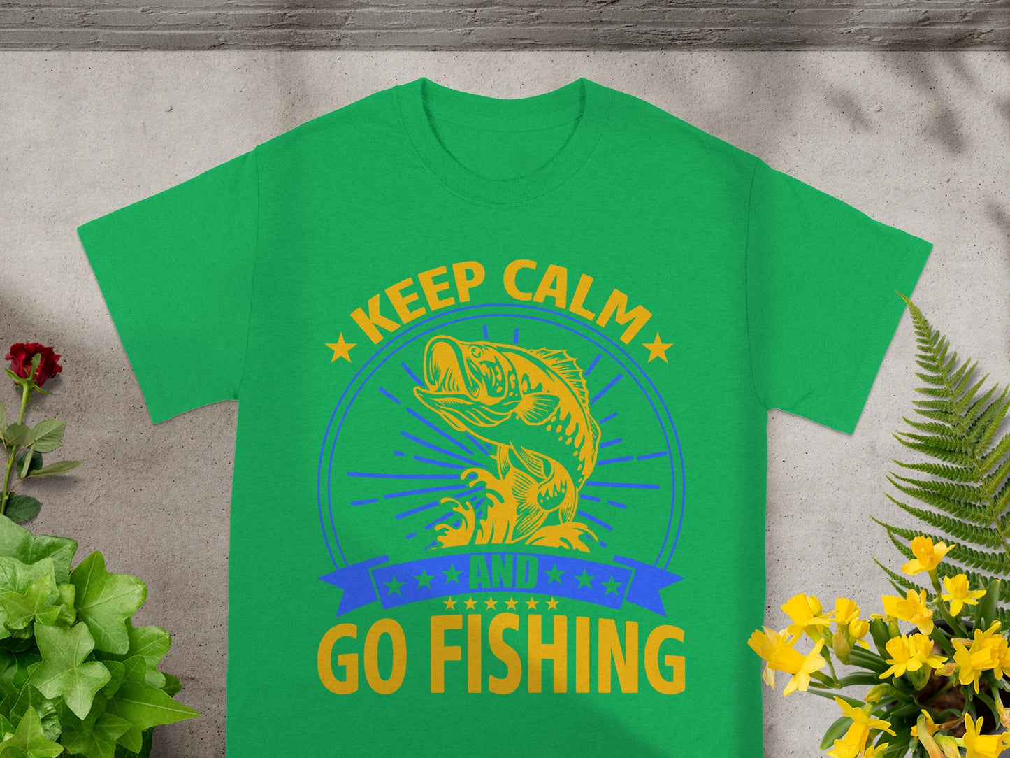 Green t-shirt with "Keep Calm and Go Fishing" graphic and a leaping fish.