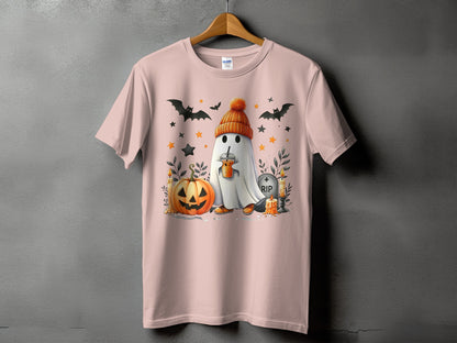 Ghost with pumpkin and RIP tombstone on a pink t-shirt.