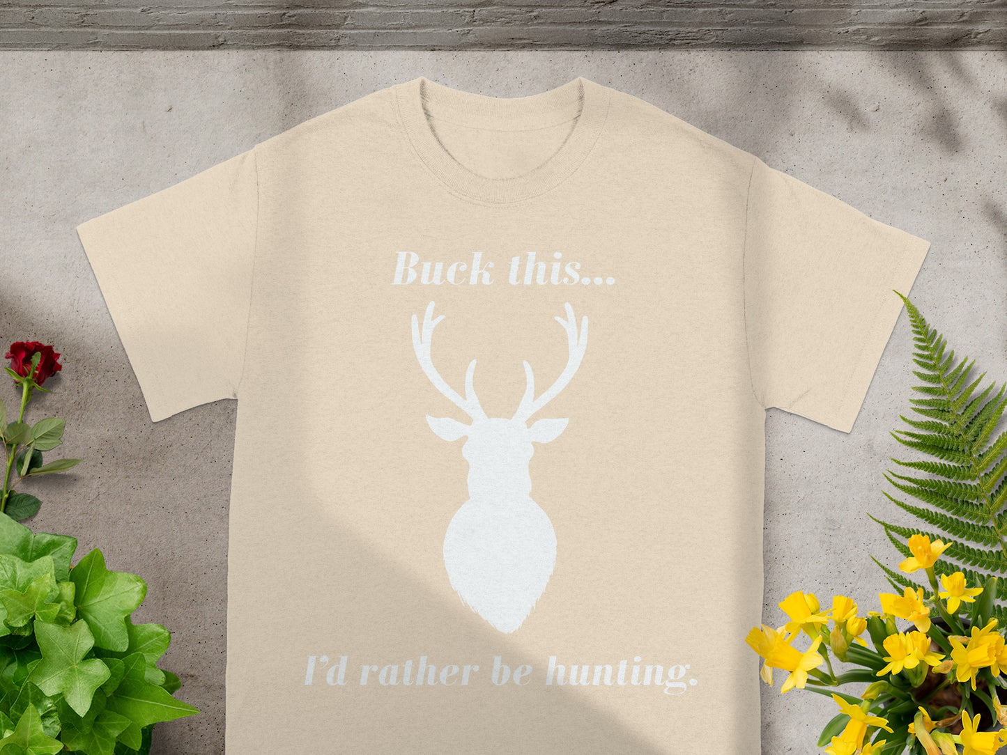 Light beige t-shirt with white text "Buck this..." and a deer silhouette.