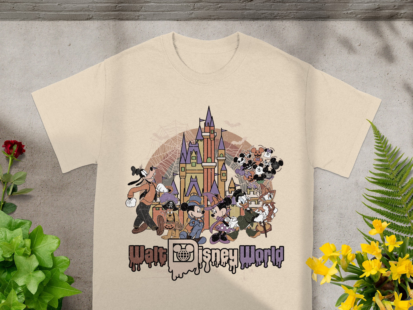 Disney characters in Halloween costumes in front of a castle, with "Walt Disney World" text.