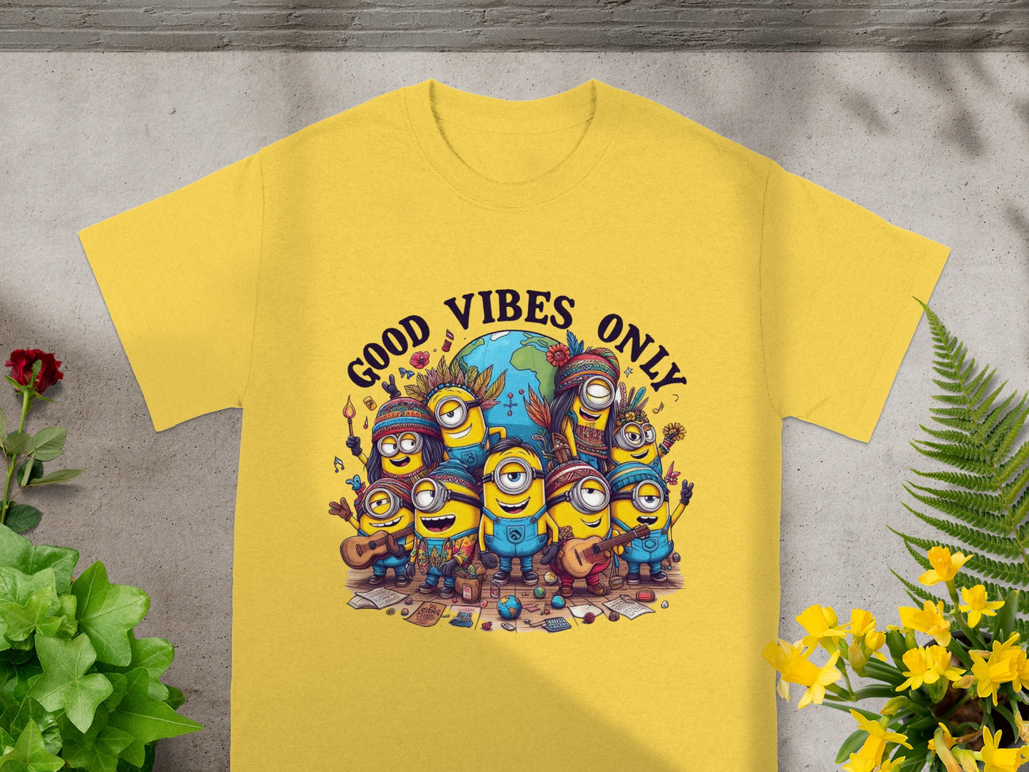 Yellow t-shirt with Minions wearing hippie attire and feathers, with "Good Vibes Only" text.