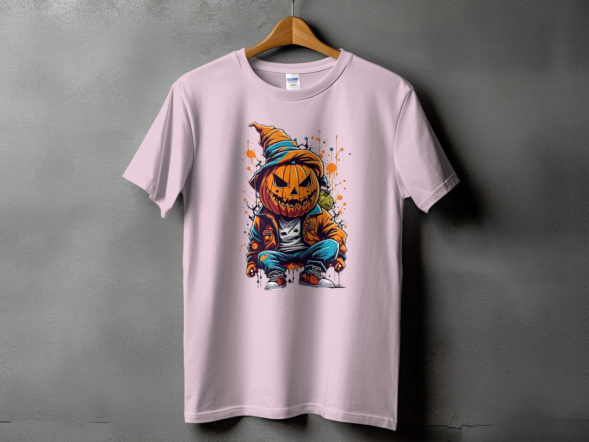 Pink t-shirt with graphic of a crouching jack-o-lantern character.