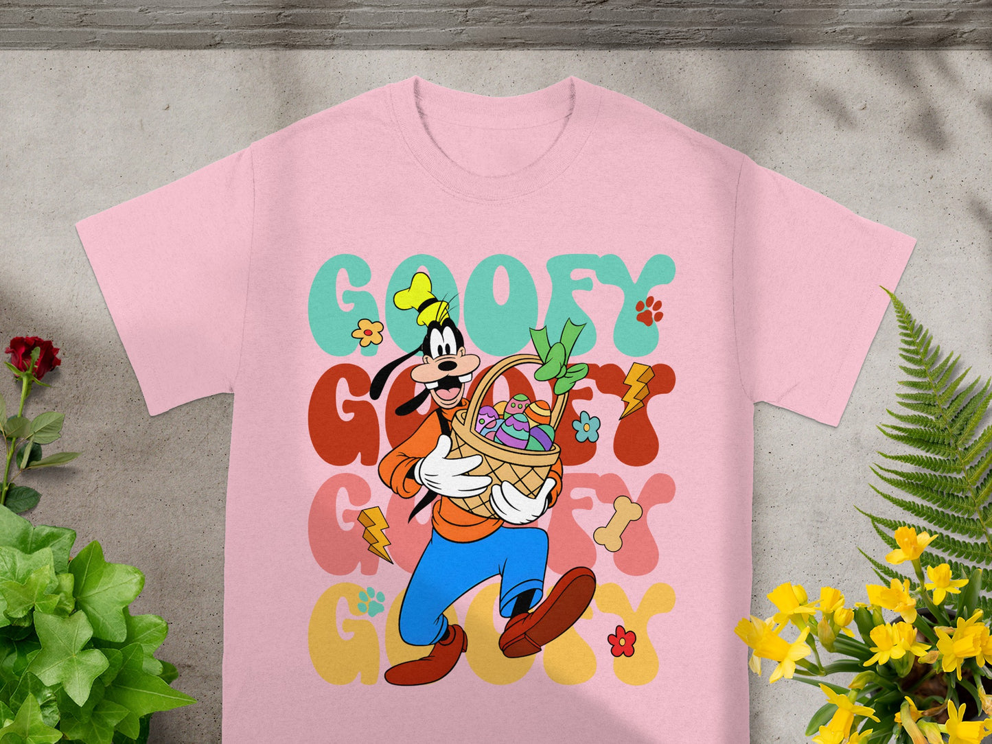 Goofy Easter graphic on a pink t-shirt.