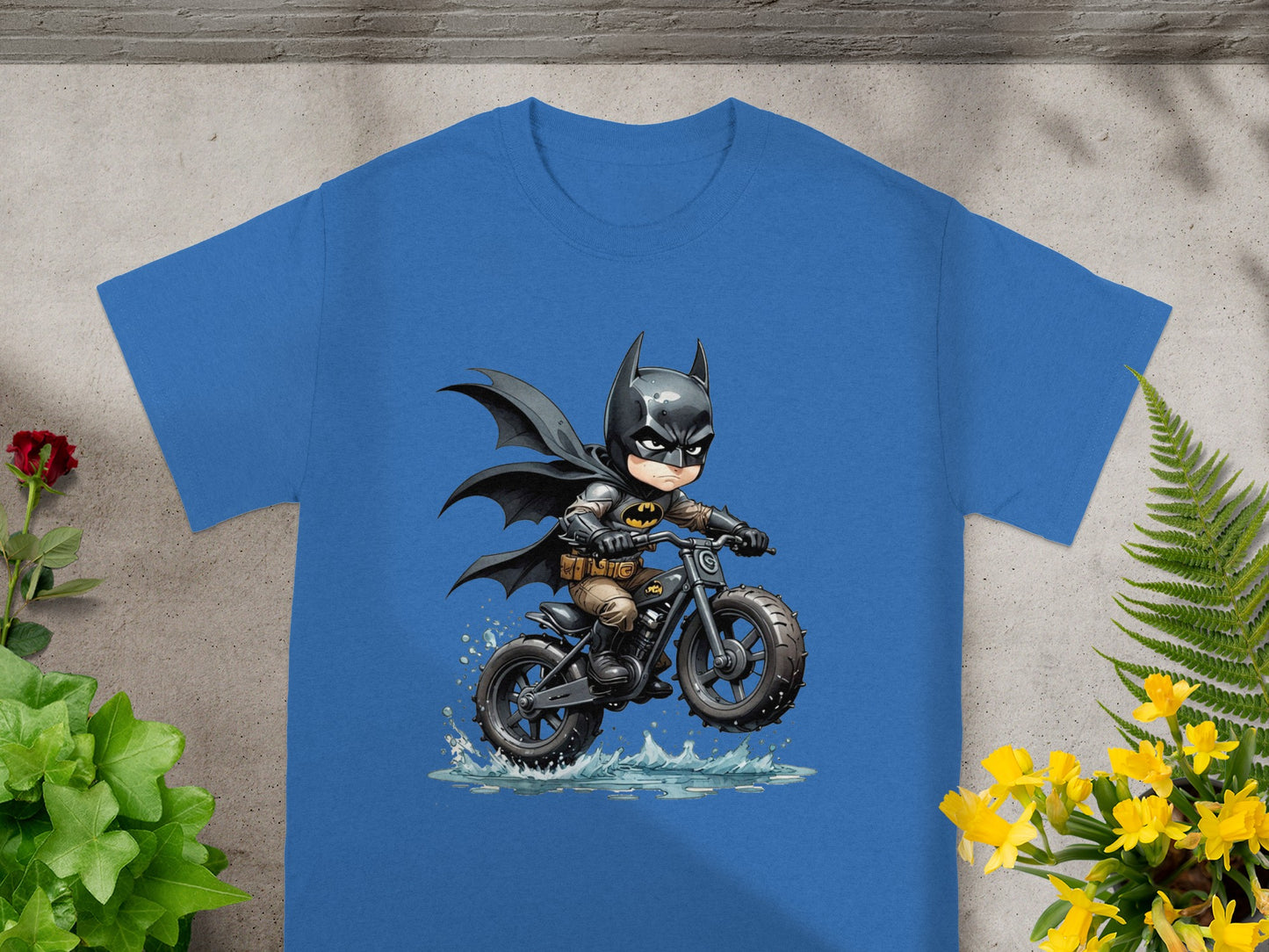 Cartoon Batman riding a motorcycle through water splashes.