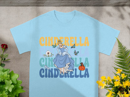 Light blue t-shirt with Cinderella illustration and text.