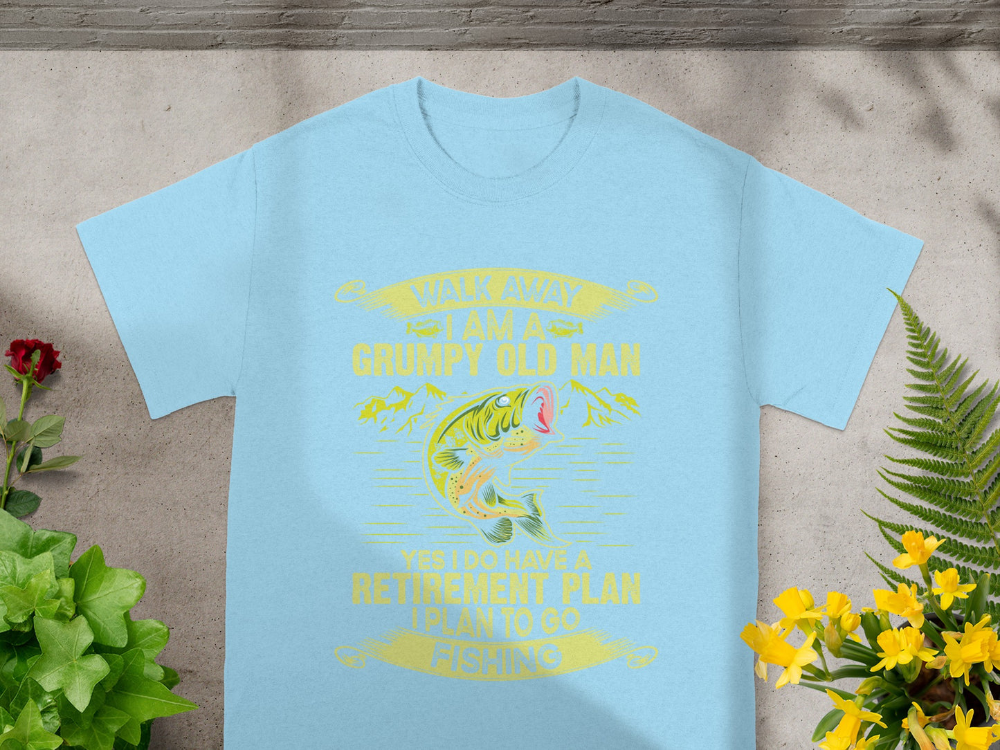 Light blue t-shirt with yellow graphic: "Walk Away, I am a Grumpy Old Man. Yes I do have a retirement plan. I plan to go fishing."