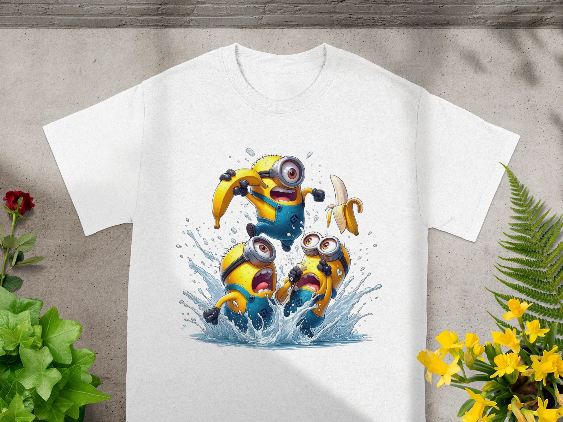 Three Minions characters in yellow shirts splashing water, holding bananas.