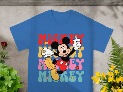 Blue t-shirt with "Mickey" in colorful wavy text and a smiling Mickey Mouse.