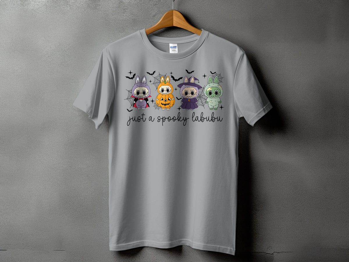 Grey t-shirt with four Halloween-themed Labubu characters and text.