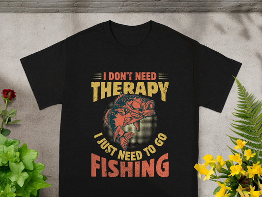 Black t-shirt with fishing graphic and text: I Don't Need Therapy, I Just Need To Go Fishing.