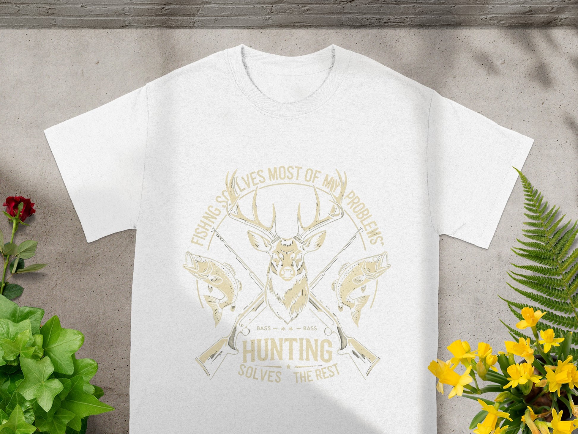White t-shirt with yellow graphic of deer, fish, guns, and text.