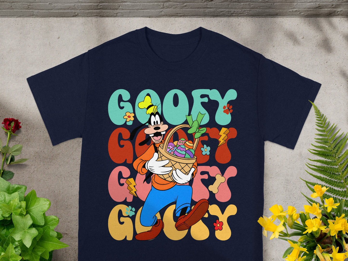 Navy t-shirt with "GOOFY" in colorful text and Goofy holding an Easter basket.