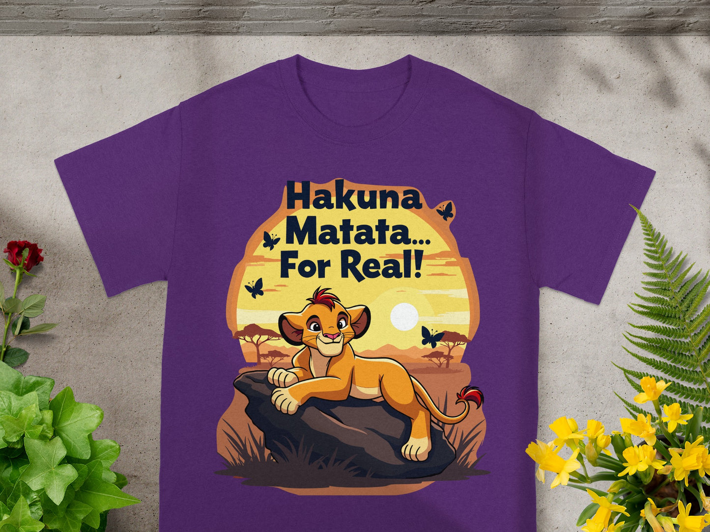 Purple t-shirt with Simba from The Lion King saying "Hakuna Matata... For Real!".