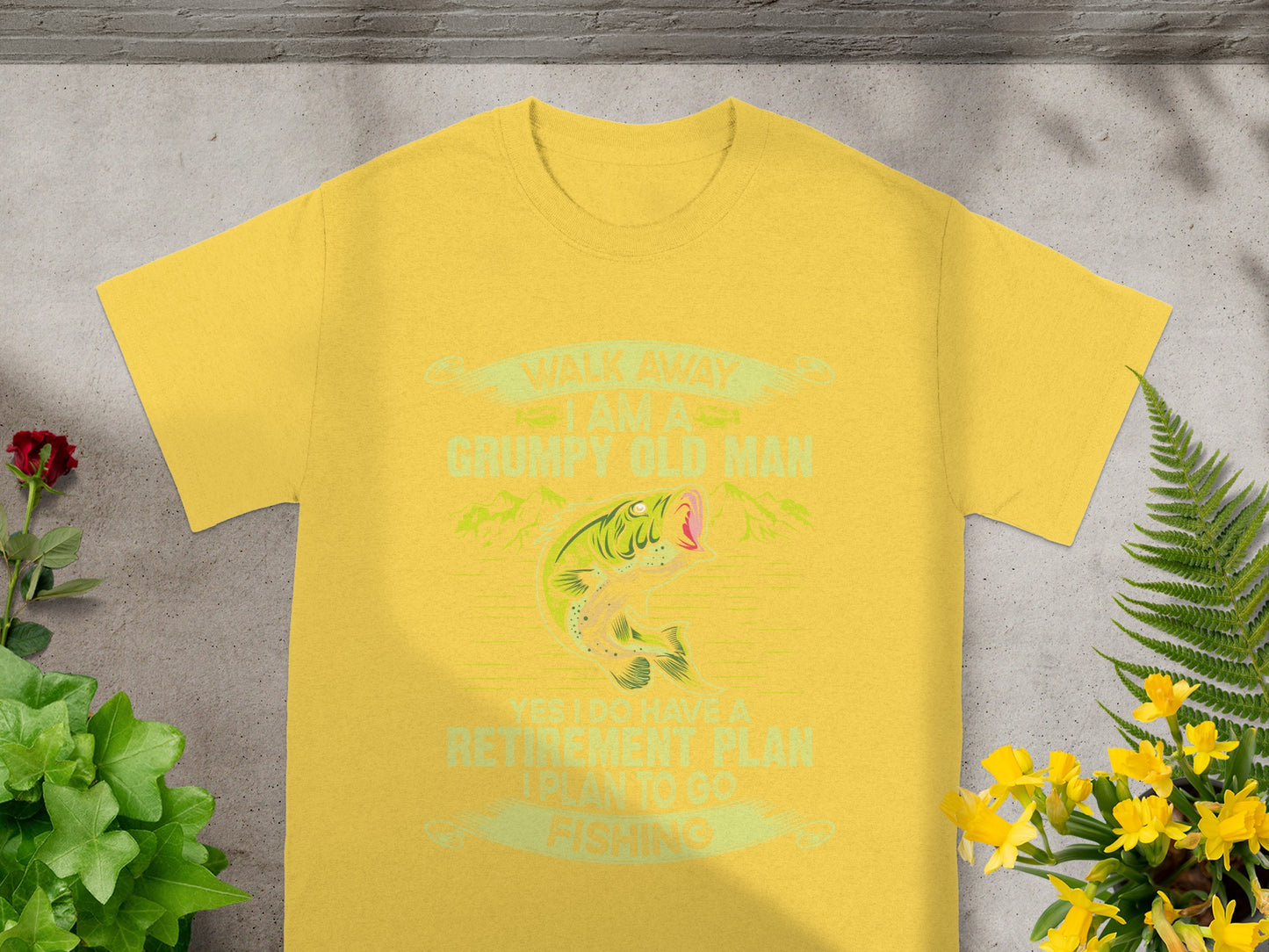 Yellow t-shirt with "Grumpy Old Man" and fishing graphic saying "Plan to go fishing."