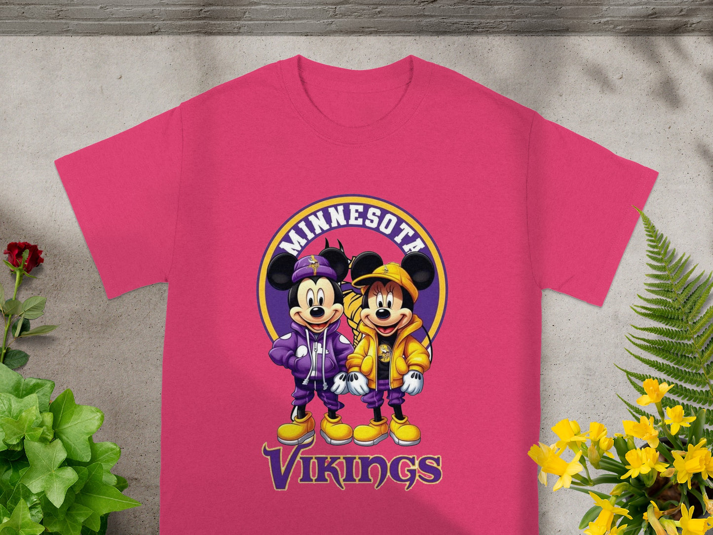 Mickey and Minnie Mouse in Minnesota Vikings jackets and hats.