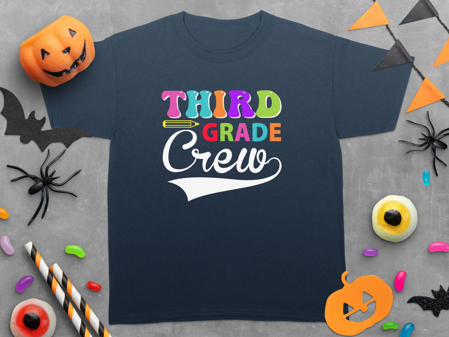 Navy t-shirt with "THIRD GRADE Crew" text and Halloween decorations.