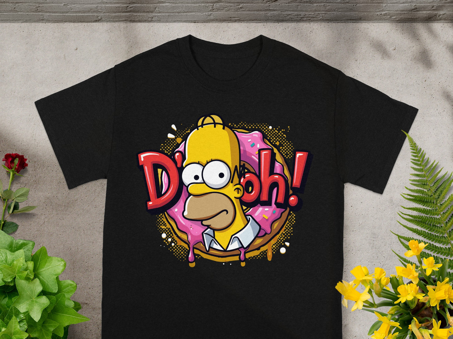 Black t-shirt with Homer Simpson saying "D'oh!" on a donut.