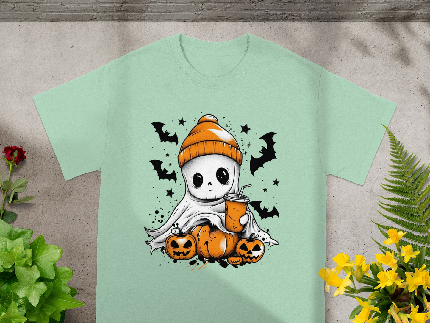 Ghost in beanie with drink and pumpkins, surrounded by bats and stars.