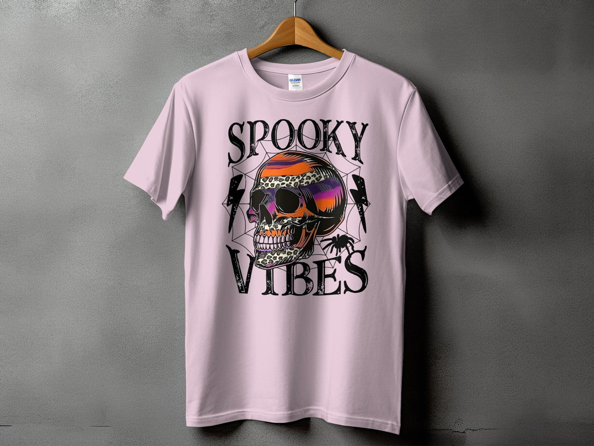 Light pink t-shirt with "Spooky Vibes" and a colorful skull graphic.