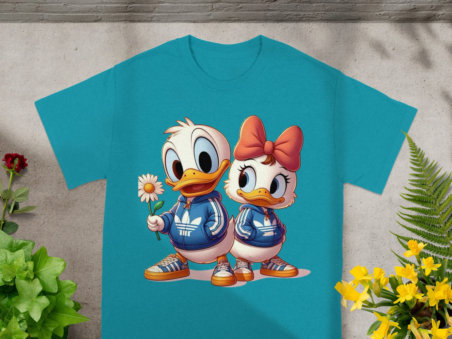 Two cartoon ducks, one holding a flower, wear matching blue tracksuits.
