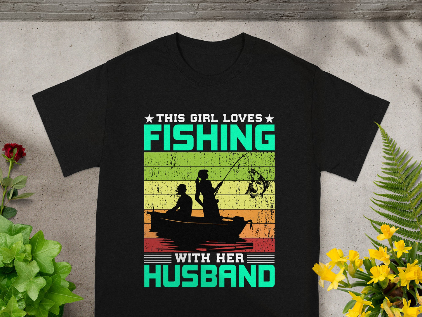 This girl loves fishing with her husband graphic tee.