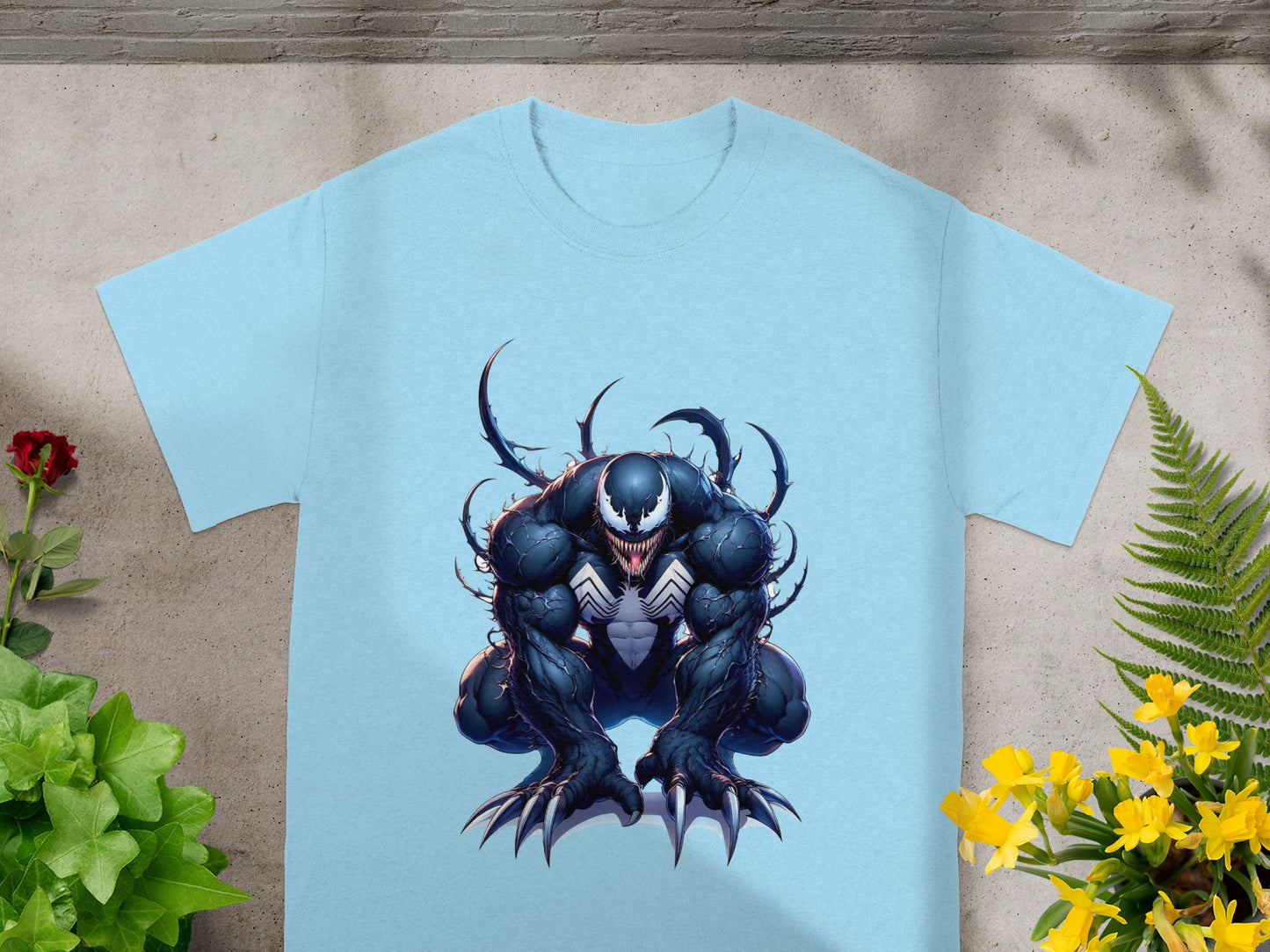 Light blue t-shirt featuring a menacing Venom illustration.