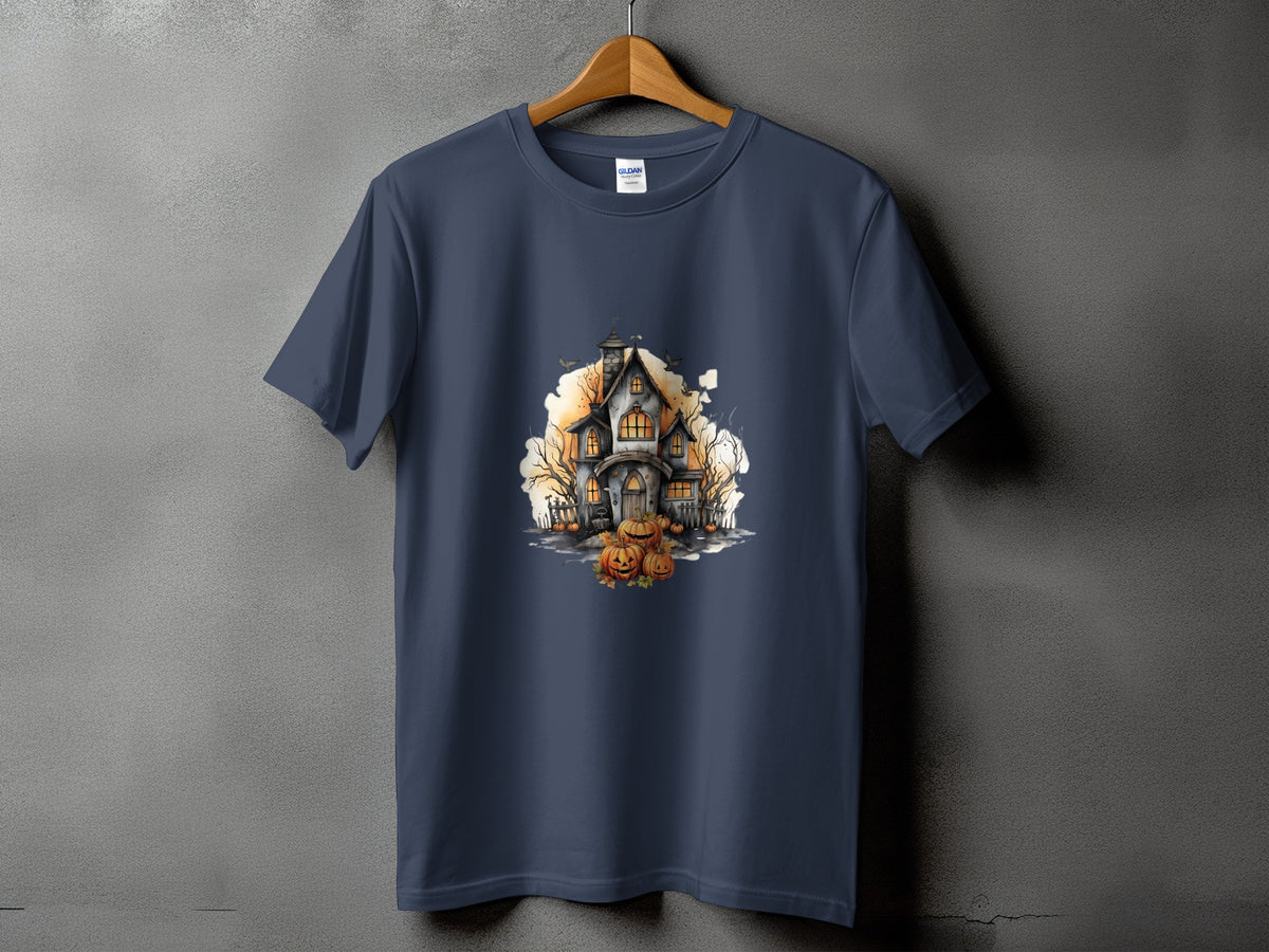 Dark blue t-shirt with a watercolor illustration of a haunted house and pumpkins.