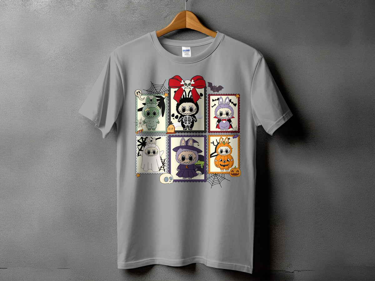 Gray t-shirt with six Halloween-themed stamp designs featuring cute characters.