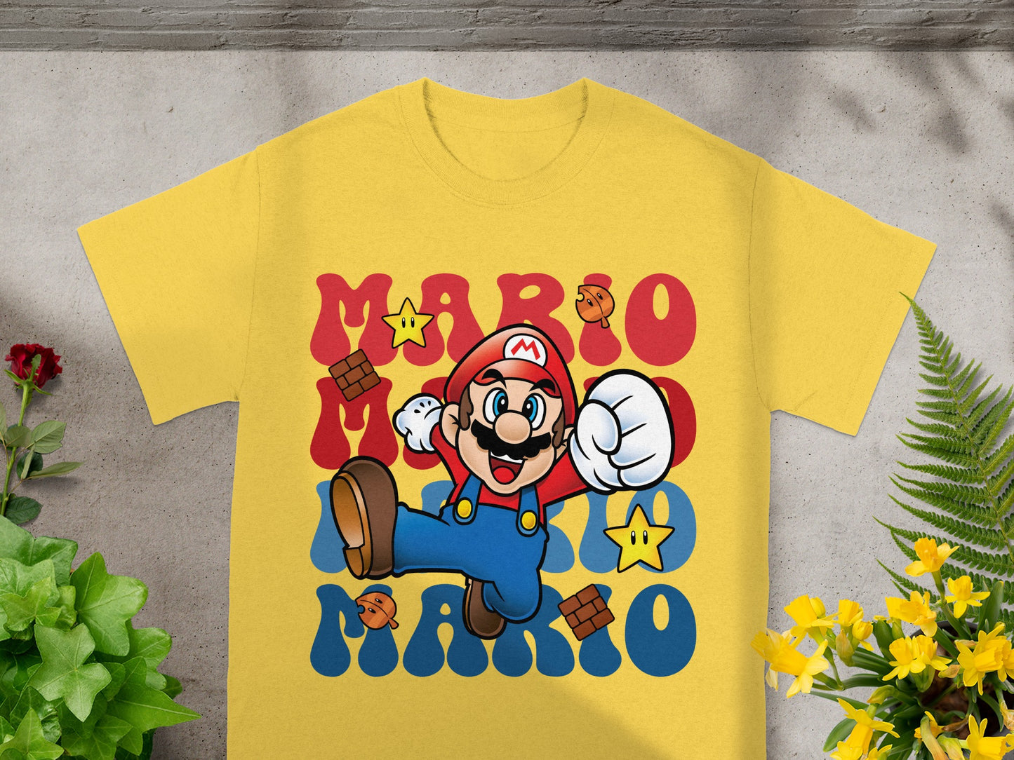 Yellow t-shirt with "MARIO" in red block letters and a cartoon Mario character.