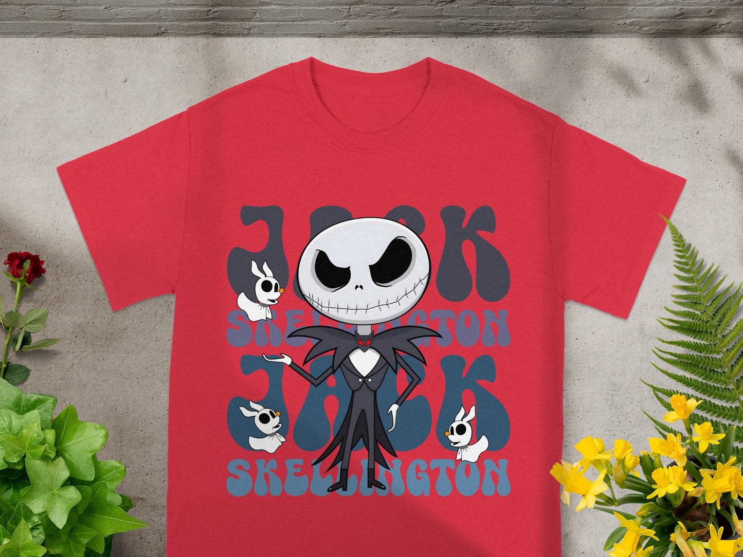 Red t-shirt with Jack Skellington graphic and yellow flowers.