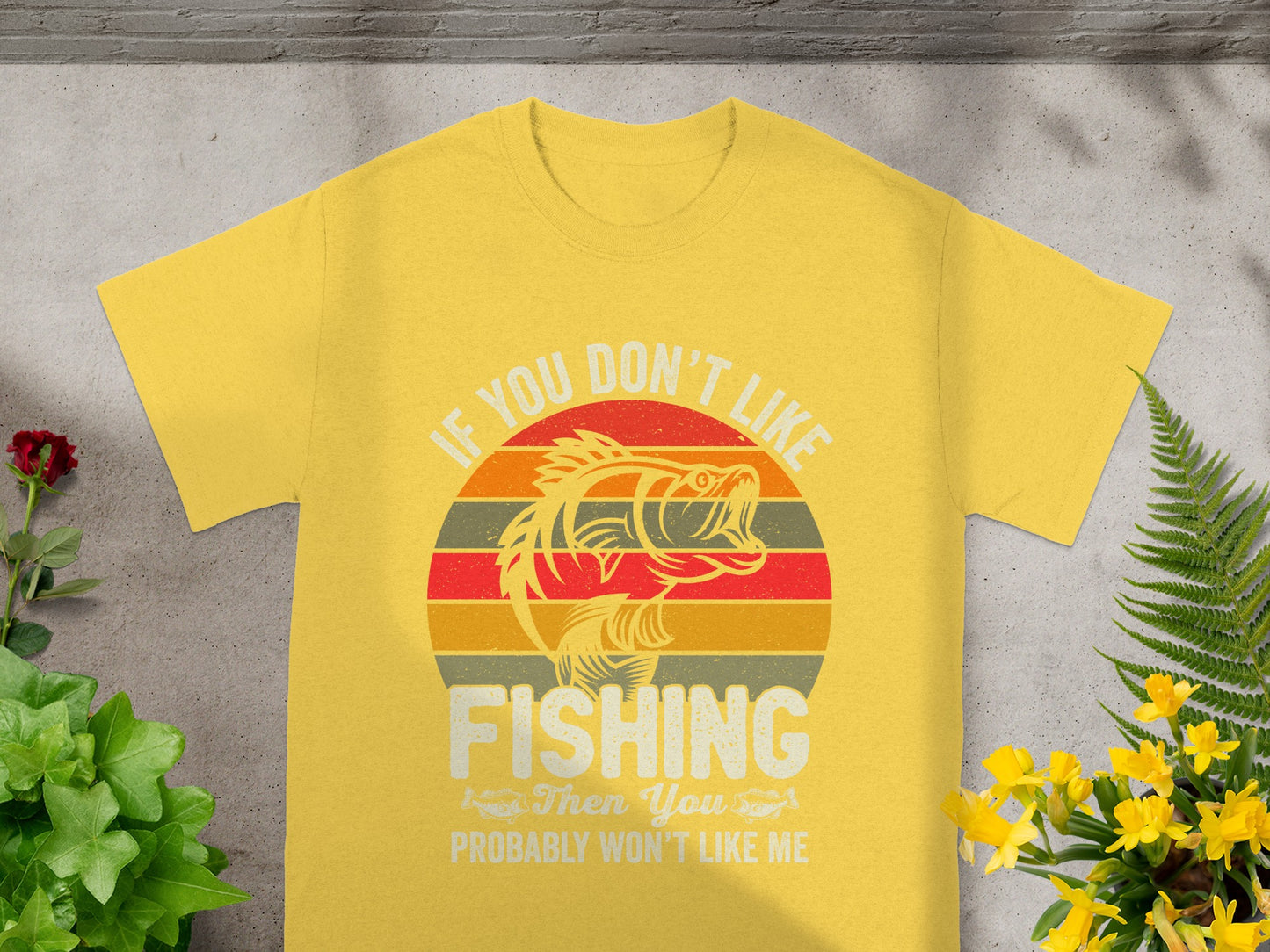 Yellow t-shirt with graphic saying "If you don't like fishing, then you probably won't like me."