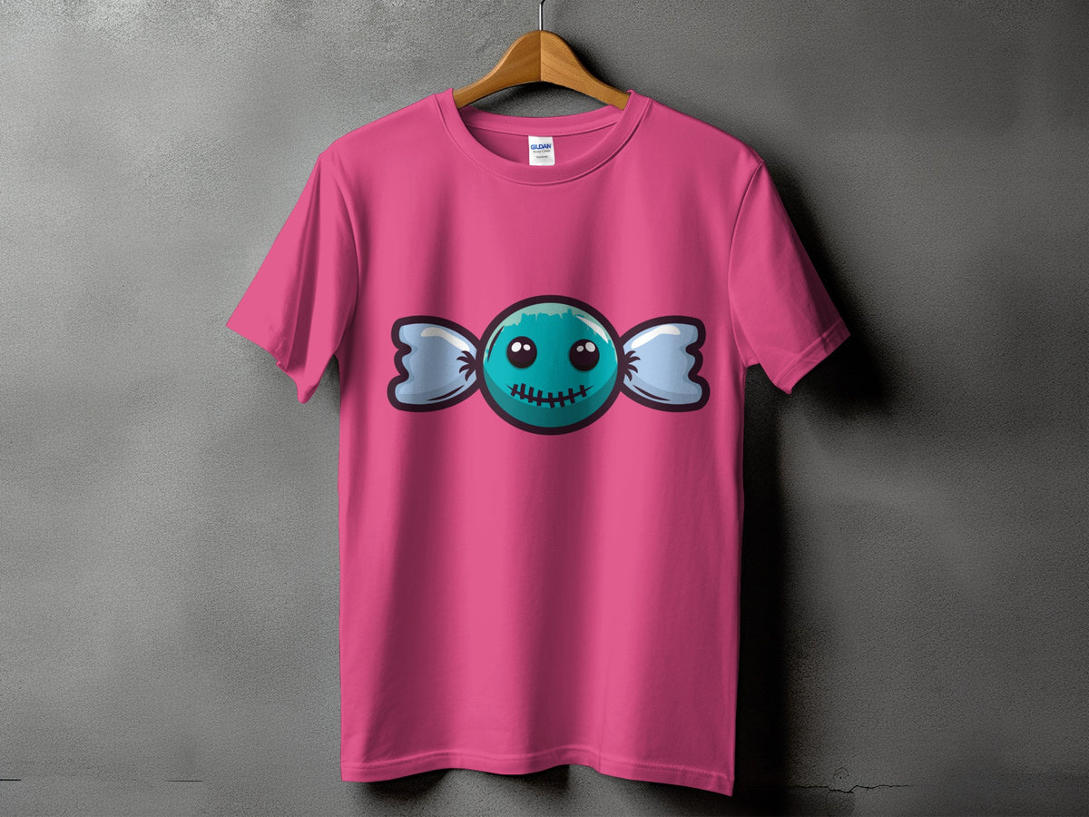 Pink t-shirt with a teal cartoon candy design featuring a smiling face.