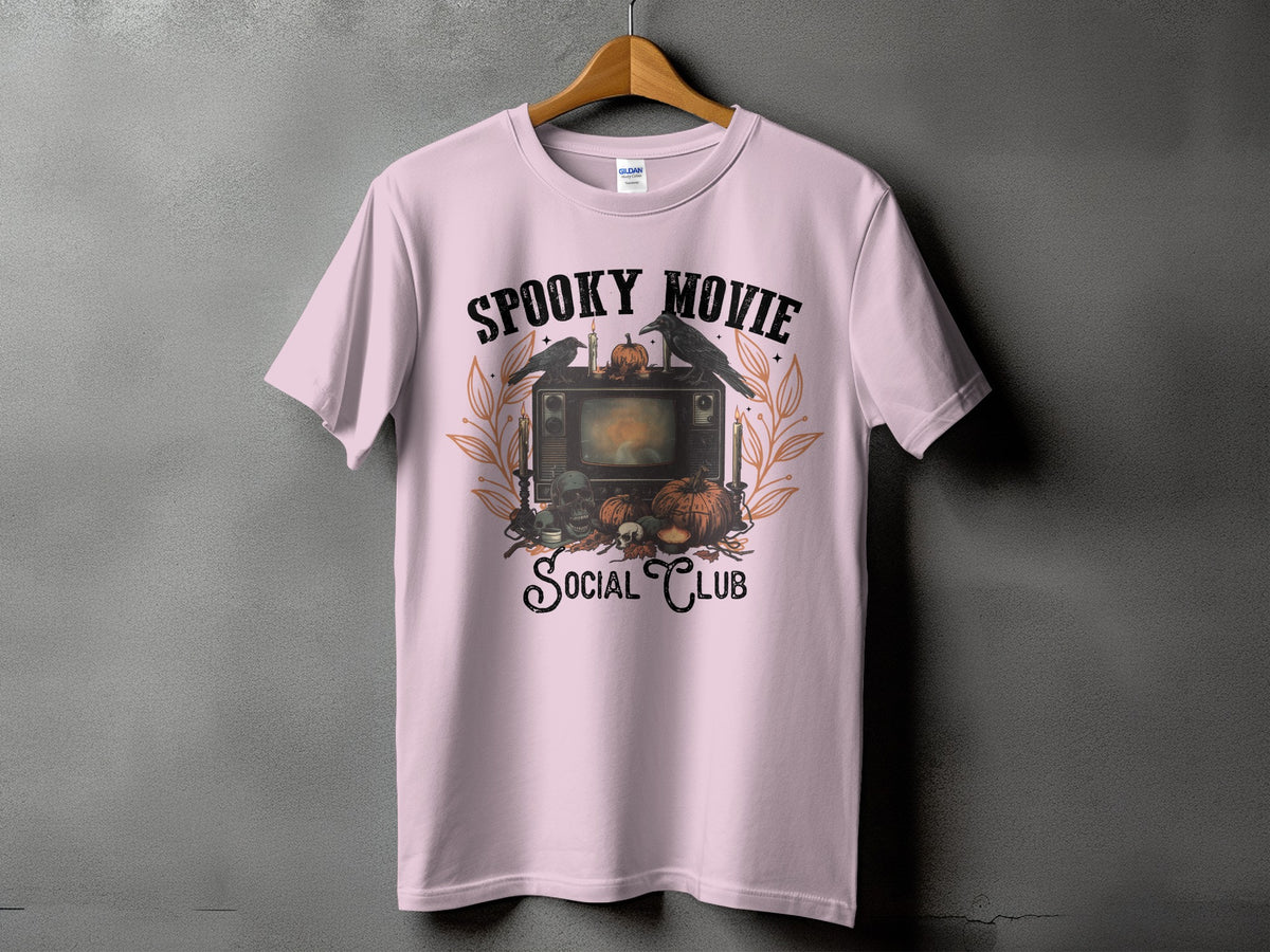 Pink t-shirt with "Spooky Movie Social Club" Halloween graphic.