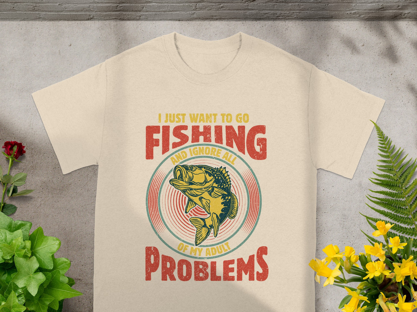 T-shirt with "I just want to go fishing and ignore all of my adult problems" graphic.