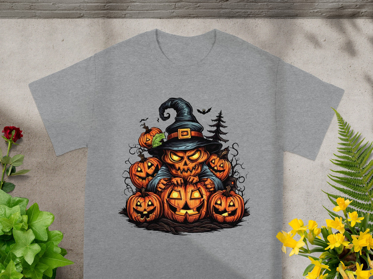 Halloween t-shirt with a cartoon jack-o'-lantern witch and surrounding pumpkins.