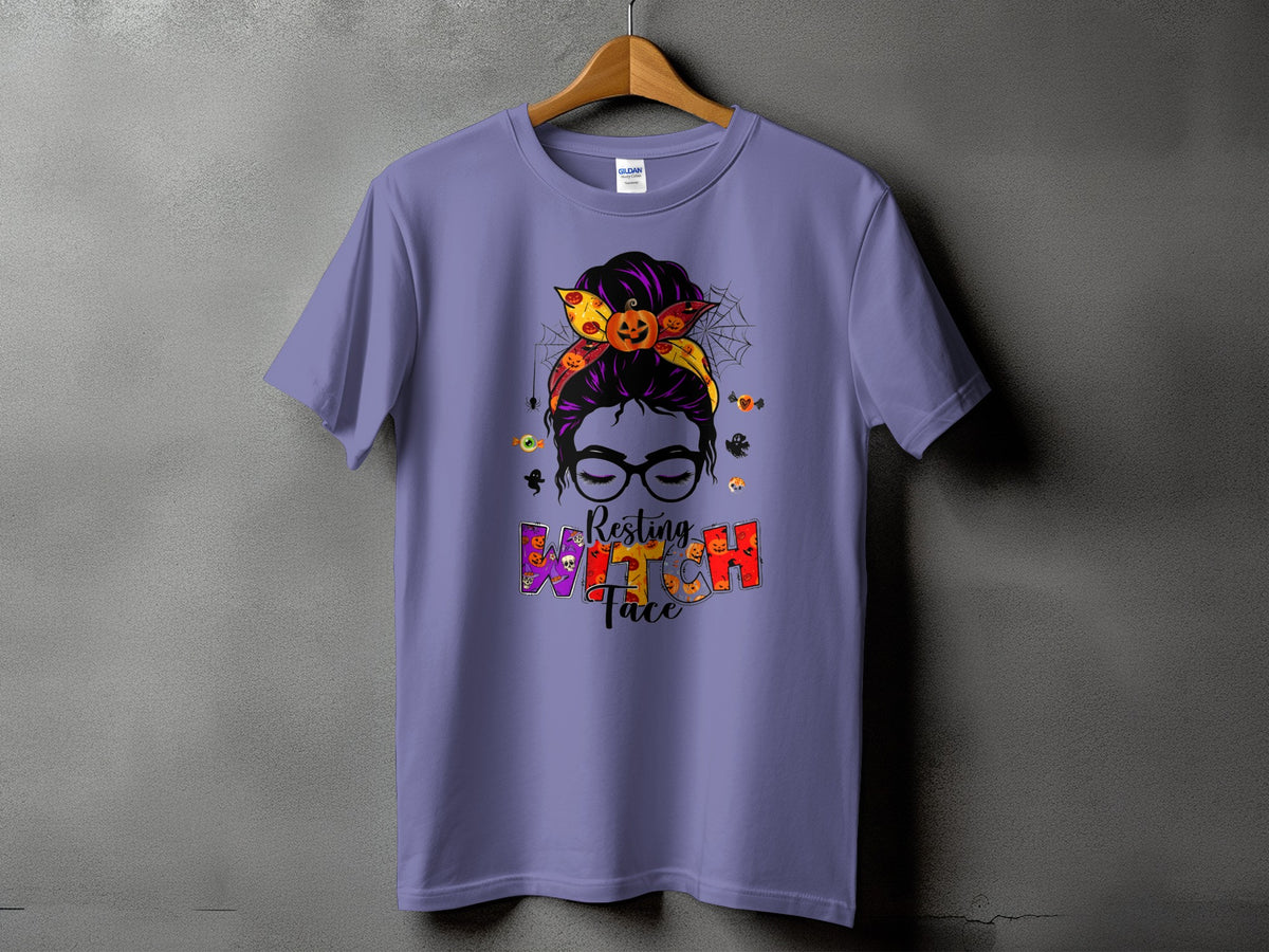 Purple t-shirt with Halloween graphic of a woman with messy bun and "Resting Witch Face" text.