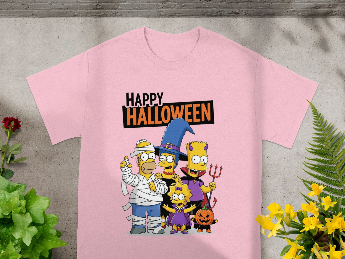 The Simpsons family in Halloween costumes with "Happy Halloween" text.