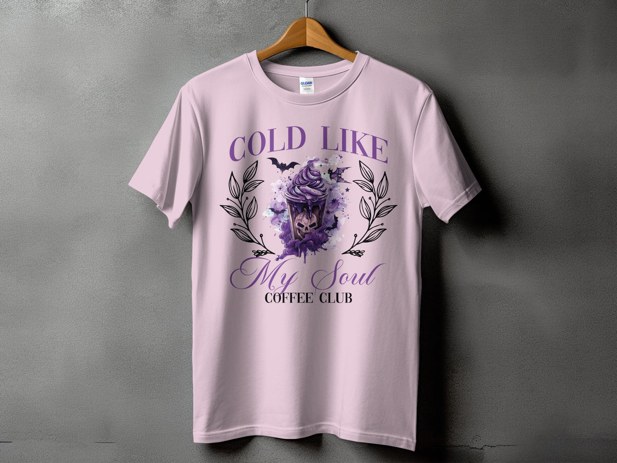 Light pink t-shirt with "Cold Like My Soul Coffee Club" text and spooky drink graphic.
